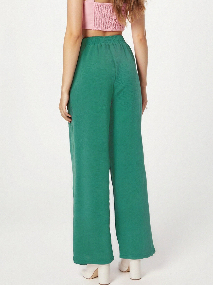 Pantalon fluide en tissu gaufré avec boutons décoratifs à l'avant - NAUMY