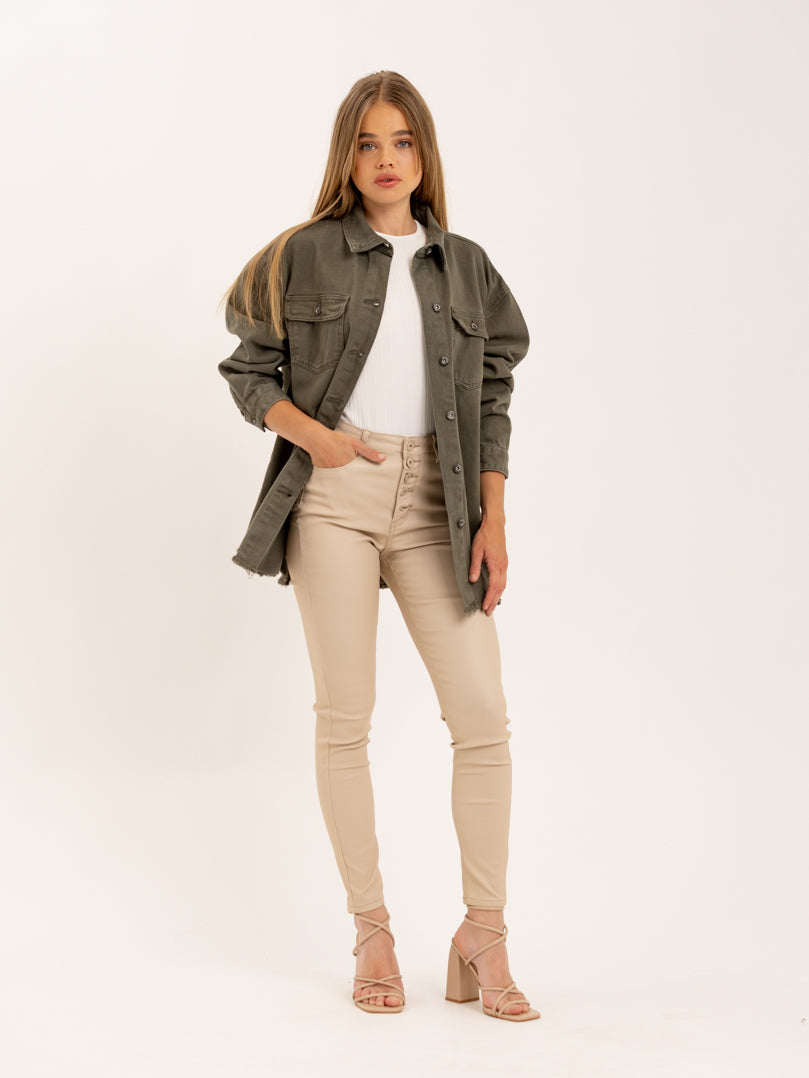 Pantalon skinny en toile enduite effet mat