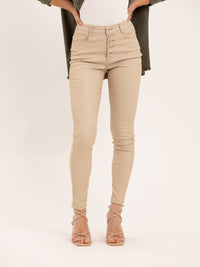 Pantalon skinny en toile enduite effet mat