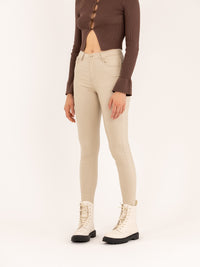 Pantalon skinny beige taille haute à bouton effet cuir