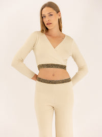 Ensemble top et pantalon en maille brodé à la taille