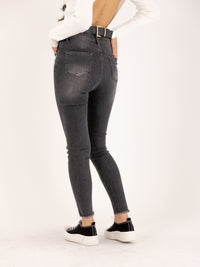 Jean skinny gris orné de cristaux ourlet effiloché