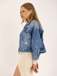 Veste en jean déchiré