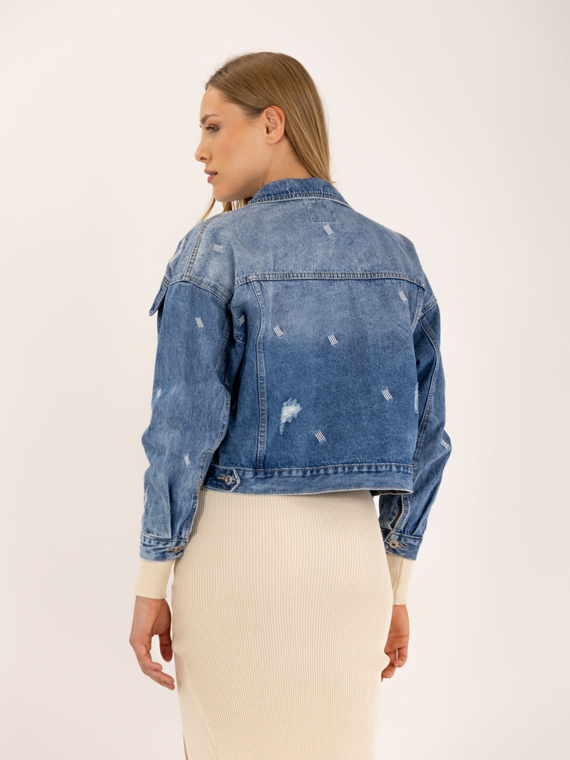 Veste en jean déchiré